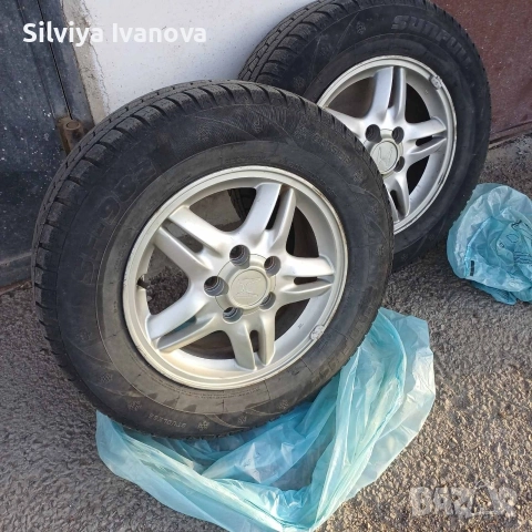Продавам четири зимни гуми с алуминиеви оригинални за Honda Cr-v , снимка 5 - Гуми и джанти - 52825585