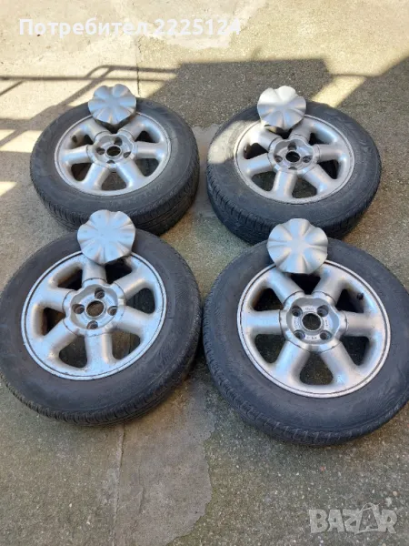 Продавам 4 броя оригинални  алуминиеви джанти с гуми 15 цола за Рено Сценик, снимка 1