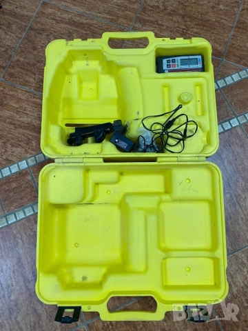 Лазерен нивел LEICA RUGBY 100. Пълен комплект зарядно и лазерна рулетка, снимка 2 - Измервателни инструменти - 51664288