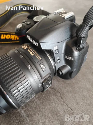 Nikon D3000 DSLR с обектив 18-55mm + чанта, батерия и зарядно, снимка 2 - Фотоапарати - 55603764
