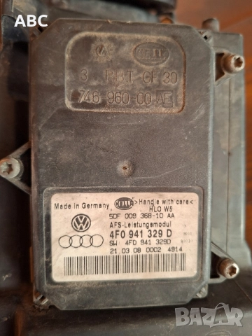 Ксенонови , завиващи фарове за Audi A6 C6 4F , снимка 5 - Части - 51113492