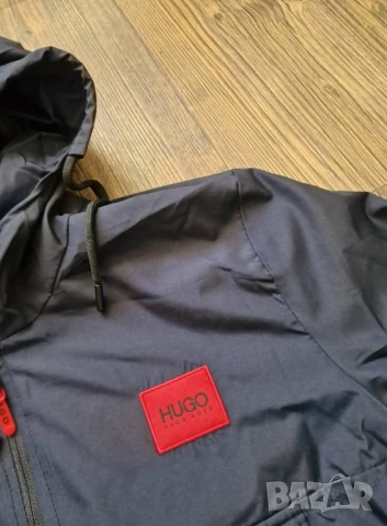 Страхотна мъжка ветровка яке HUGOСтрахотна мъжка ветровка яке HUGO BOSS 
размери M L 2XL 
 , снимка 4 - Якета - 51462050