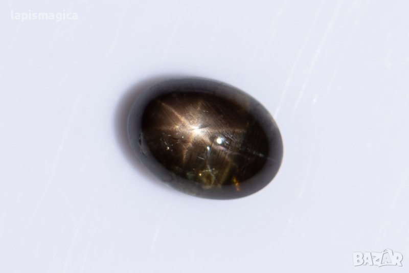 Черен звезден сапфир 1.40ct 6-лъчева звезда овален кабошон, снимка 1