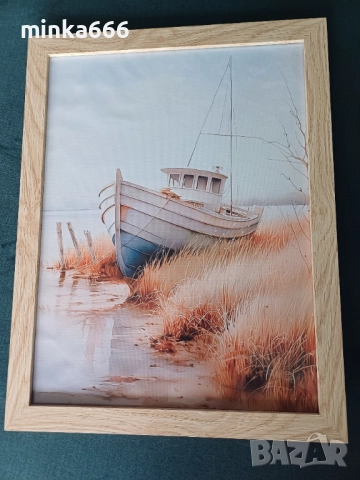 Картина с дървена рамка.