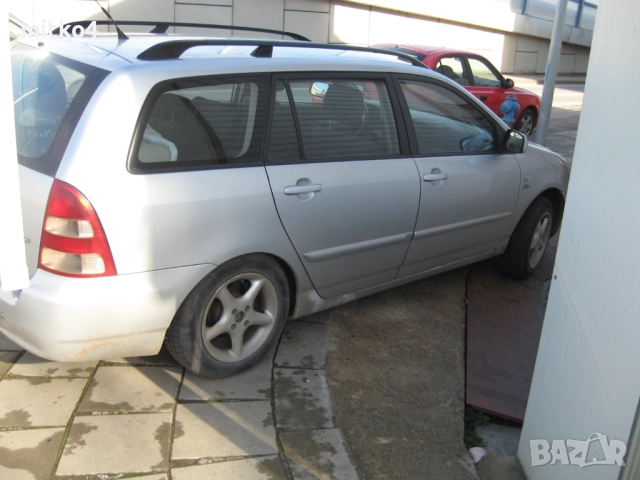 тойота корола 2,0d-4d e12 комби , снимка 11 - Автомобили и джипове - 52598823