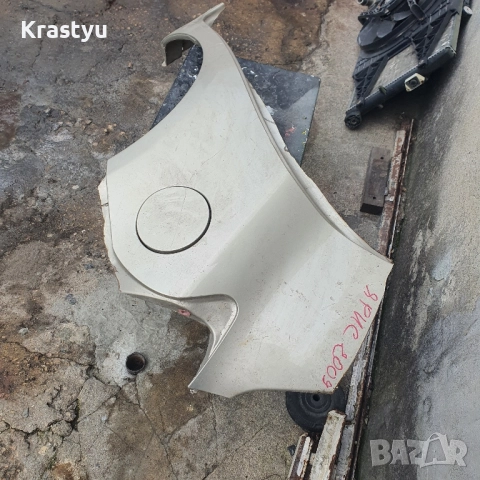 заден ляв калник /вежда с капачката за тойота Ярис 2009