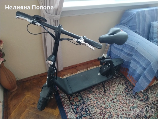 Електрическа тротинетка със седалка 