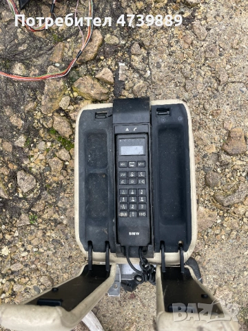 Продавам оригинална телефонна слушалка с държач