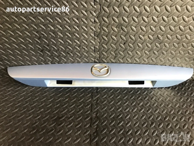 Дръжка за отваряне на задния капак за регистрационен номер синя за Mazda 626 (2001) GG3E50810, снимка 2 - Части - 53696461