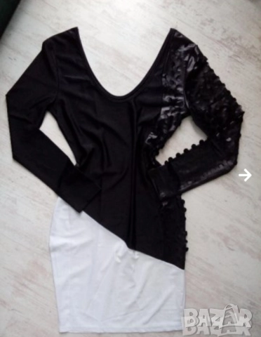 Елегантна рокля с кожен ръкав