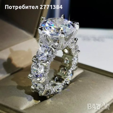 Диамантен дамски официален пръстен .Супер качество !! Пръстенът има над 20 камъка Сваровски по него.