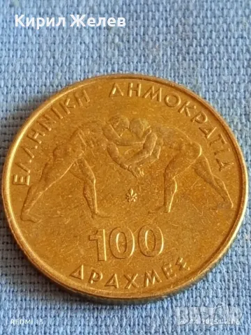Монета 100 драхми 1999г. Гърция 45 Световно първенство по борба Атина 37482, снимка 2 - Нумизматика и бонистика - 49986513
