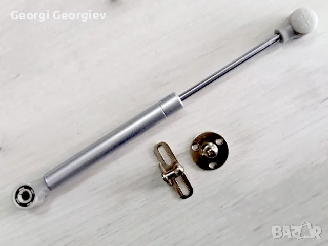 Амортисьор за повдигане на мебелна вратичка