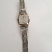 Мъжки кварцов часовник SEIKO SQ 7123-5010 DAY/DATE, снимка 9 - Антикварни и старинни предмети - 41905260