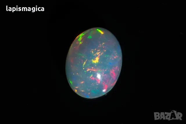 Етиопски опал 1.32ct овален кабошон, снимка 3 - Други - 48310474