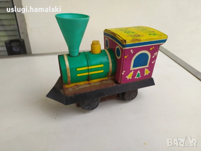 Стара ламаринена играчка