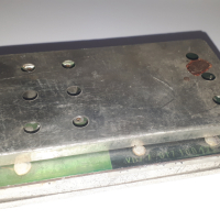 Стара електронна платка в метална кутия с дупки, снимка 1 - Друга електроника - 44841393