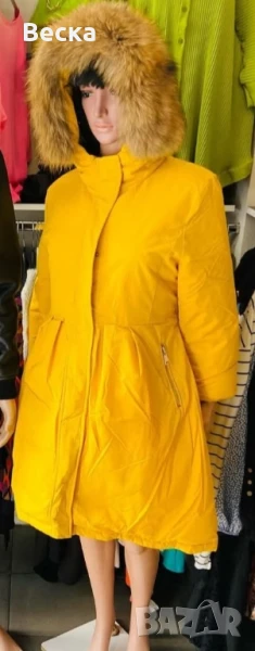 Продавам дълго зимно дамско яке в жълт цвят, снимка 1
