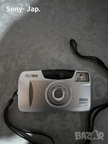 фотоапарат-Canon zoom 65