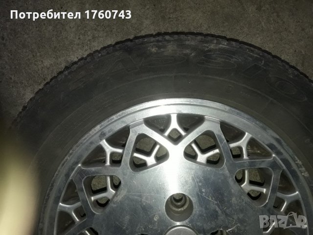 2 бр. Лети джанти 14 ц.4/100 центр отвор 61ммРЕНО Оригинални с гуми  DEBICA  185/65 /14, снимка 5 - Гуми и джанти - 33799993