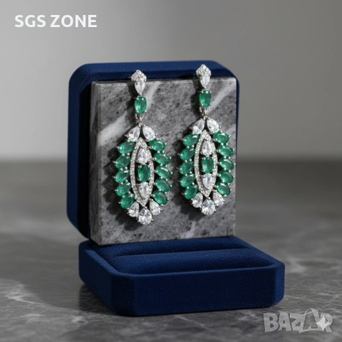 уникални сребърни обеци с изумруди