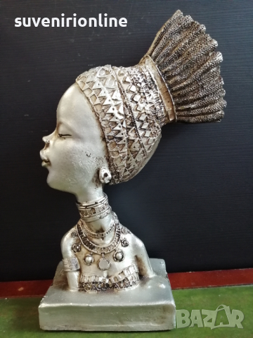 Декоративна статуетка африканка