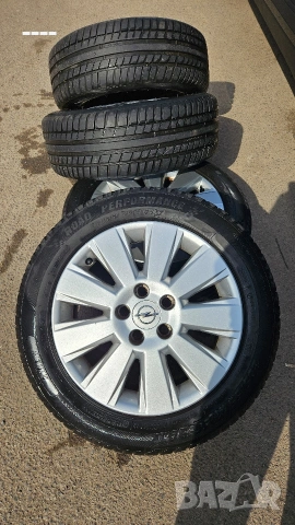 Алуминиеви джанти Opel + гуми Riken 205/55/16 94W XL DOT21, снимка 11 - Гуми и джанти - 53706777