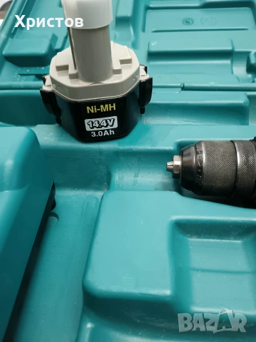 Акумулаторен ударен винтоверт Makita в комплект с куфар, зарядно устройство DC1414 и батерия. , снимка 2 - Винтоверти - 53611939