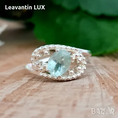 5736
Сребърен пръстен със син Топаз
, снимка 1