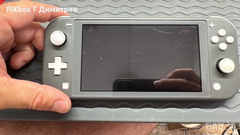 Хакнат Nintendo Switch Lite с 128гб карта и много игри , снимка 1