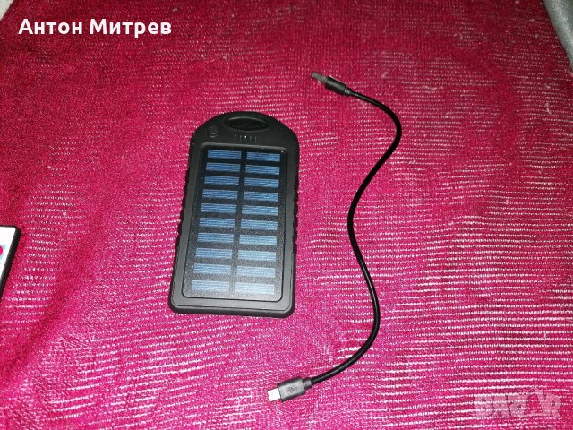 Продавам външна батерия в запазен вид - между 5000 и 10000 MAH,, снимка 1 - Външни батерии - 34212037