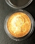 Позлатена испанска монета в капсула, снимка 1