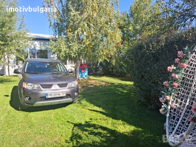 Джип Mitsubishi Outlander, снимка 11 - Автомобили и джипове - 52119017