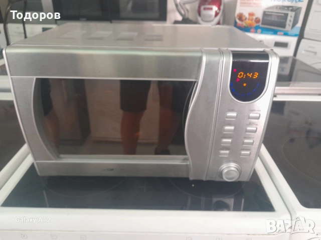 Микровълнова печка с грил Clatronic