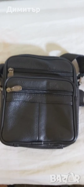 Продавам мъжка черна чанта от 100 процента  естествена кожа с пет отделения с цип , снимка 1