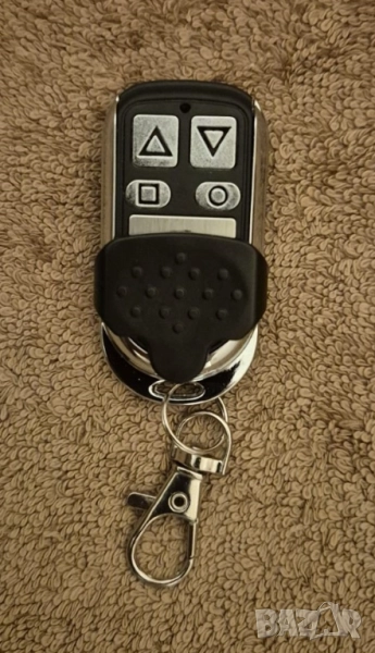 Обучаемо дистанционно за гаражи и бариери с фиксиран код на 433.92 Mhz, снимка 1