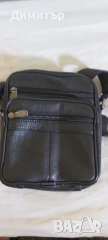 Продавам мъжка черна чанта от 100 процента  естествена кожа с пет отделения с цип 