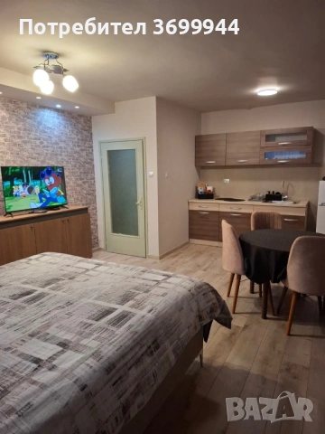 Луксозен двустаен апартамент в центъра на града, снимка 2 - Квартири, нощувки - 53079536