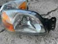 фар на МАЗДА 121 2002г., снимка 1
