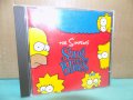 Компакт диск на - The Simpsons - The Simpsons Sing The Blues/ 1990г.