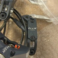 НОВИ Спирачки Shimano XTR-975 PM/IS, снимка 3 - Части за велосипеди - 41943722