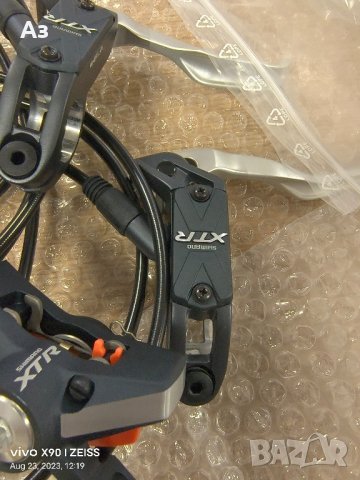 НОВИ Спирачки Shimano XTR-975 PM/IS, снимка 3 - Части за велосипеди - 41943722
