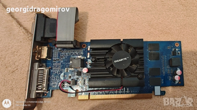 Видеокарта Gigabyte GeForce 210 1GB DDR3 64-bit, снимка 3 - Видеокарти - 52035133