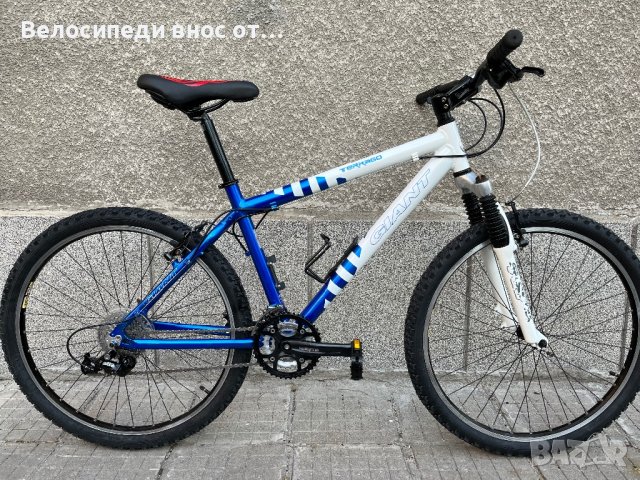 Алуминиев велосипед GIANT 26 цола  3х9 скорости палцови команди shimano DEORE преден амортисьор , снимка 1 - Велосипеди - 44349104