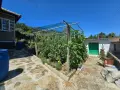 Продава се къща с голям двор 1,5 дка, гараж, стопански постройки и обновени инсталации, снимка 6