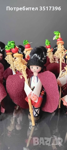 Сурвакар със стъргана дрянова сурвакница - дървена кукла с национална носия - Сурвакари