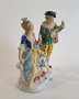 Порцеланова фигурка на дама и каеалер с музикален инструмент, снимка 2