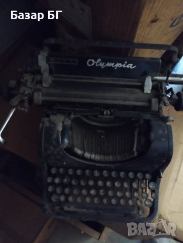 Пишеща машина Olympia , снимка 4 - Антикварни и старинни предмети - 41843650