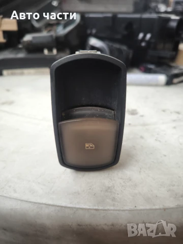 Превключвател за стъклоповдигач на предна лява врата OPEL CORSA D 13206806