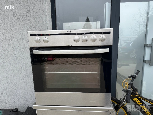 Фурна за вграждане AEG Инокс с плот 